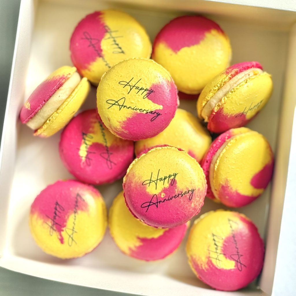 personalised-swirl-pink-yellow-macarons